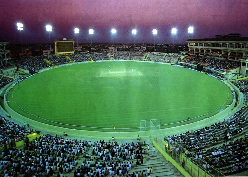 Cricket field, stands and floodlights at PCA IS Bindra Stadium near Noble Callista Mohali