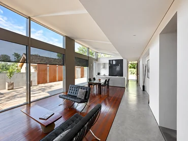 Sunlit apartment balcony and seating area at Noble Callista Mohali